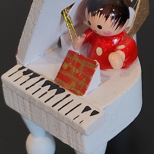 Miniature Piano Ornament with an Angel on Top