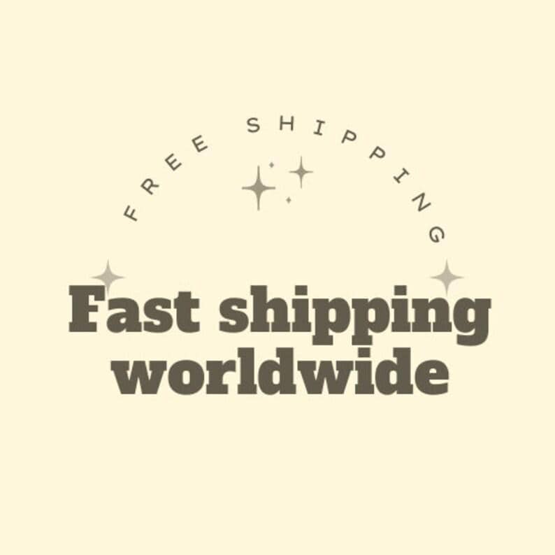 May include: A graphic design on a pale yellow background featuring the text "FREE SHIPPING" in a curved arch above four-pointed star icons. Below this, the text "Fast shipping worldwide" is displayed in a bold, dark brown sans-serif font.