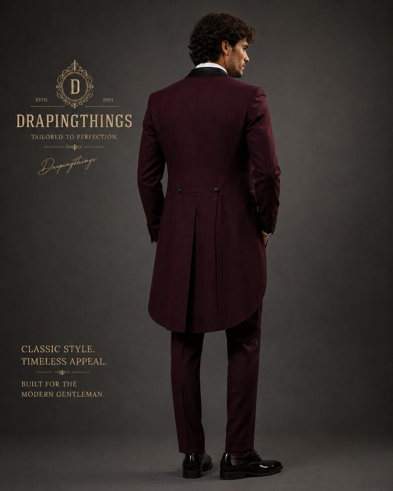 May include: A deep burgundy tailcoat suit featuring a black lapel, two back buttons, and a long tail design. The text D DRAPINGTHINGS TAILORED TO PERFECTION, Drapingthings, CLASSIC STYLE. TIMELESS APPEAL. BUILT FOR THE MODERN GENTLEMAN is visible.