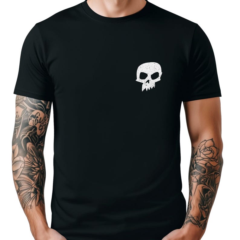 May include: Black t-shirt with a white skull and crossbones graphic on the left chest. The skull has a distressed look.