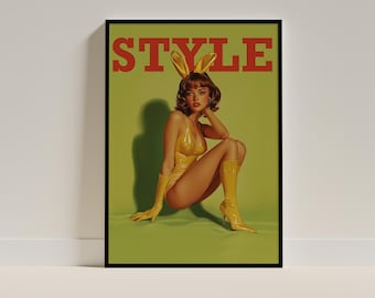 May include: A framed poster with the word "STYLE" in red block letters at the top. The poster features a woman in a yellow bodysuit, gloves, and boots, with bunny ears. The background is a solid green.