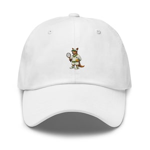 May include: White baseball cap featuring an embroidered cartoon kangaroo in tennis attire, holding a racket and a tennis ball. The kangaroo wears a green and white striped shirt and shorts. The cap has a curved brim and a button on top.