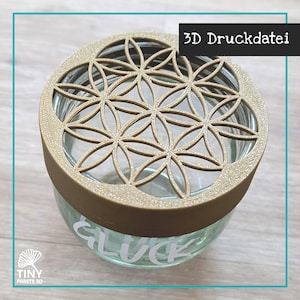 Peut inclure: Un bocal en verre transparent avec un couvercle décoratif de couleur or orné d'un motif floral. Le bocal porte l'inscription "GLUCK". Le texte "3D Druckdatei" est dans un rectangle noir en haut à droite.