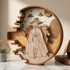 May include: A wooden Star Wars themed art piece featuring Darth Vader, Stormtroopers, and spaceships. The artwork is laser cut and layered, creating a 3D effect. The piece is in a circular frame with a unique, stepped design on the left side.