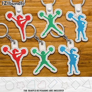 May include: Six different coloured keychains featuring a cheerleader silhouette with pom-poms. The keychains are made of white leather and have a silver metal ring. The shapes keychains are included.