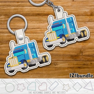 Pode incluir: Um chaveiro de caminhão bordado em azul e amarelo com um chaveiro prateado. O chaveiro está sobre um fundo de madeira. O texto "IZlbundle" é visível no canto inferior direito da imagem. O texto "THE KEYCHAINS SHAPES ARE INCLUDED" é visível no centro inferior da imagem.
