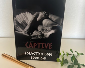 Captive (Forgotten Gods Reverse Harem Book One)  by DM Page
