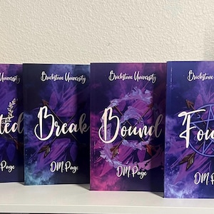 May include: Four books with matching covers are displayed. Each book has a dark purple background with white text that reads "Brickstone University" at the top. The titles are "Fated", "Break", "Bound", and "Found". The author's name, "DM Page", is at the bottom.