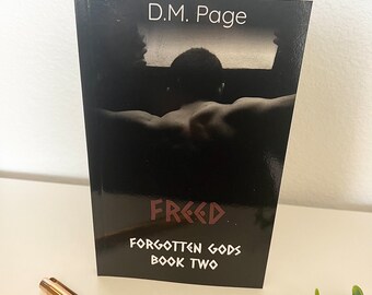 Freed (Forgotten Gods Reverse Harem Book Two)  by DM Page