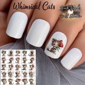 May include: White nail art featuring a whimsical cat design. The nails showcase a detailed watercolor illustration of a cat holding a flower. The image includes the text "Whimsical Cats" and "Back Roads Craft Studio".