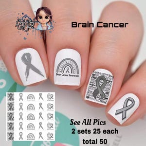 May include: Set of 50 grey and white nail decals featuring a brain cancer awareness ribbon, a rainbow with hearts, and the words "Brain Cancer Awareness" and "fighter warmer Strong HOPEOM CURE BRAVE believe CBAVE KOURN Fighter HOPE NOVE CURE fighteng HOT BRAVECOURAGE".