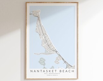 May include: A black and white map print of Nantasket Beach in Hull, Massachusetts. The map shows the streets and coastline of the area. The print is framed in a light wood frame.