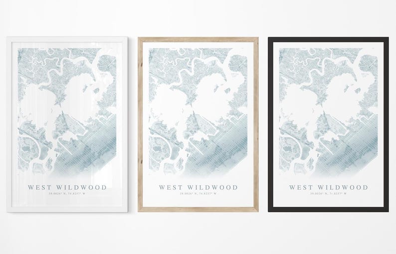 May include: Three framed prints of a map of West Wildwood, New Jersey. The maps are in shades of blue and white, with the text "WEST WILDWOOD" and coordinates at the bottom. Frames are white, natural wood, and black.