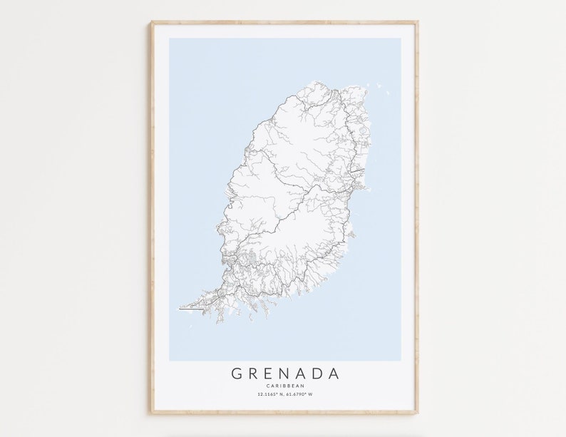 May include: A printable map of Grenada, a Caribbean island, with a light blue background and black lines showing the roads and waterways. The map is framed in a light wood frame. The text "GRENADA" is printed below the map, along with the coordinates "12.1145&deg; N, 61.6790&deg; W".