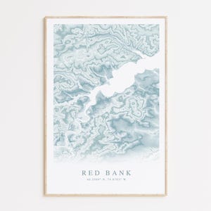 May include: A blue and white topographic map print of Red Bank, New Jersey with the coordinates 40.1288° N, 74.0703° W.