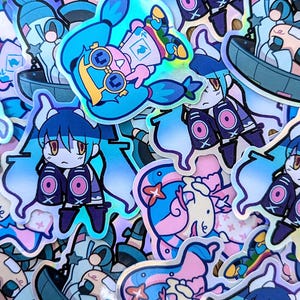 May include: A collection of colourful holographic stickers featuring cartoon characters. The stickers are in various shapes and sizes, with some featuring a blue and white colour scheme and others featuring pink and blue. The stickers are perfect for adding a touch of whimsy to laptops, water bottles, or journals.