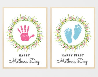May include: Two printable Mother's Day cards featuring floral wreaths. The first card has a pink handprint inside the wreath and the text "Happy Mother's Day". The second card has blue footprints inside the wreath and the text "Happy First Mother's Day".