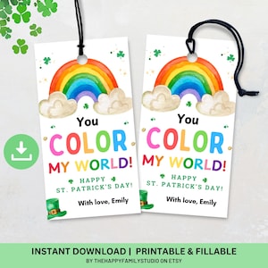 May include: Printable gift tag with a rainbow, clouds, and shamrocks. The text reads "You color my world! Happy St. Patrick's Day! With love, Emily".