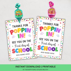 May include: Two printable school-themed cards with colorful text that reads "Thanks for Poppin' In! See you on the First day of School." Each card is topped with a wrapped lollipop. The bottom of the card says "Add Name Here."