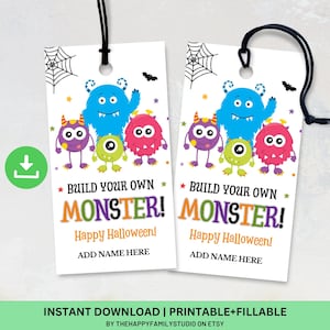 May include: Two white Halloween gift tags with a monster theme. Each tag features a blue monster, three smaller monsters, and the text "BUILD YOUR OWN MONSTER! Happy Halloween! ADD NAME HERE."