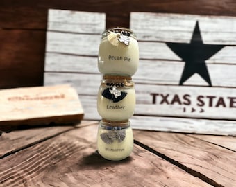 Soy Wax Scented Candle in a Small Corked Vessel. Hand poured and Made in small batches. Choose a scent. Each scent comes with designed jar.
