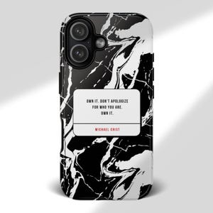 May include: A black and white marble-patterned phone case featuring a central white rectangular box with the black text: OWN IT. DON'T APOLOGIZE FOR WHO YOU ARE. OWN IT. Below this, the name MICHAEL CRIST is printed in red capital letters.