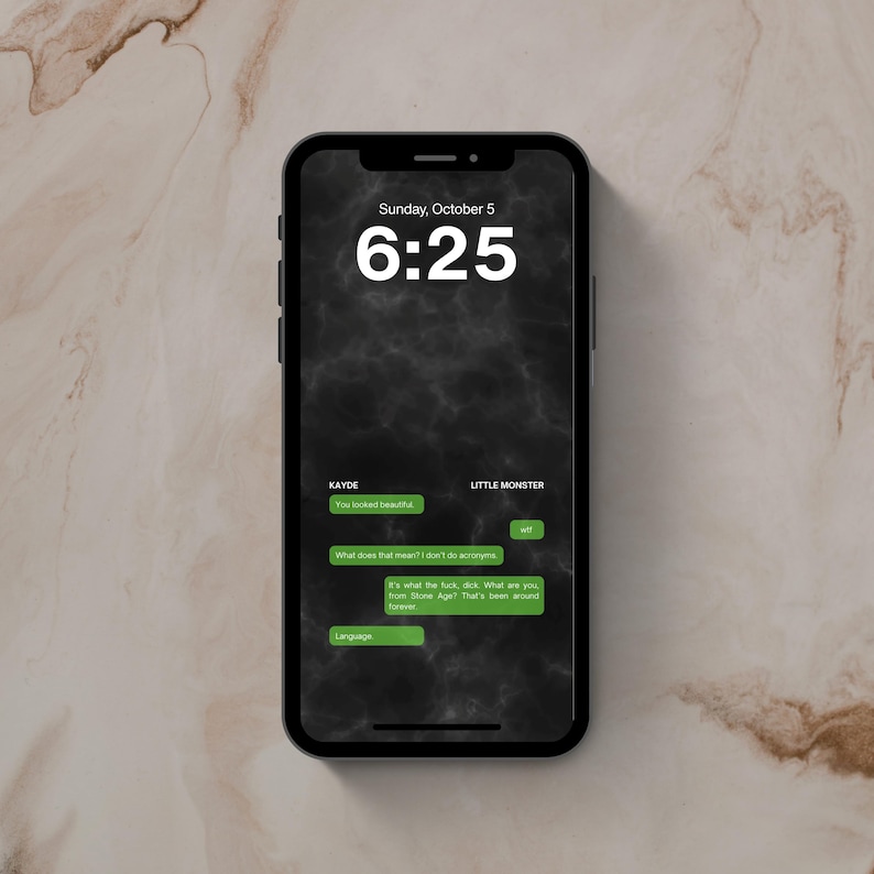May include: A smartphone displaying a lock screen with a dark, smoky background. The time is 6:25 on Sunday, October 5. A text message conversation is visible with green bubbles containing text between Kayde and Little Monster, including the word wtf.