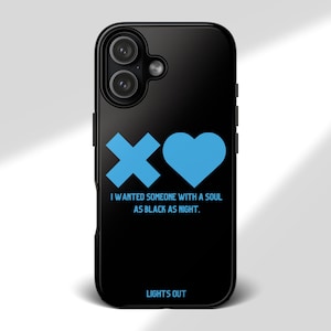 May include: Black phone case featuring a blue cross and heart graphic. The text "I WANTED SOMEONE WITH A SOUL AS BLACK AS NIGHT" and "LIGHTS OUT" are displayed on the case.