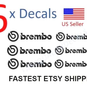 May include: Six black Brembo decals are displayed on a white background. The number 6 is in red, and the word "Decals" is in blue. An American flag and the text "US Seller" are also present.