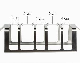 Un support de cuisson vertical professionnel modèle CA MIA PRO pour les côtes levées, les os en T, la Fiorentina, les côtes levées et les légumes.