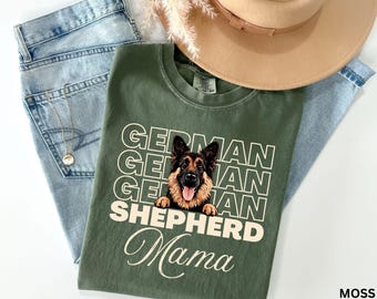 May include: Green t-shirt with a German Shepherd dog graphic and the text "German Shepherd Mama" in a retro style font.
