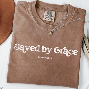 Saved by Grace Comfort Colors® Shirt Lovely Faith T-Shirt Women Easter Jesus Boho Tees Bible Verse Aesthetic Merch Trendy Christian Inspire
