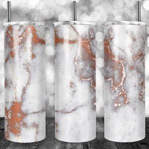 May include: Three stainless steel tumblers with a white and copper marble design.