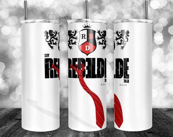 May include: Three white stainless steel tumblers with a black and red design. The tumblers feature a crest with the letters RBD and a red tie. The text "Rebelde Tour 2023" is printed on the tumblers.
