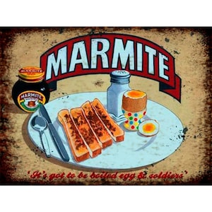 Marmite huevo cocido y soldado - placa de metal