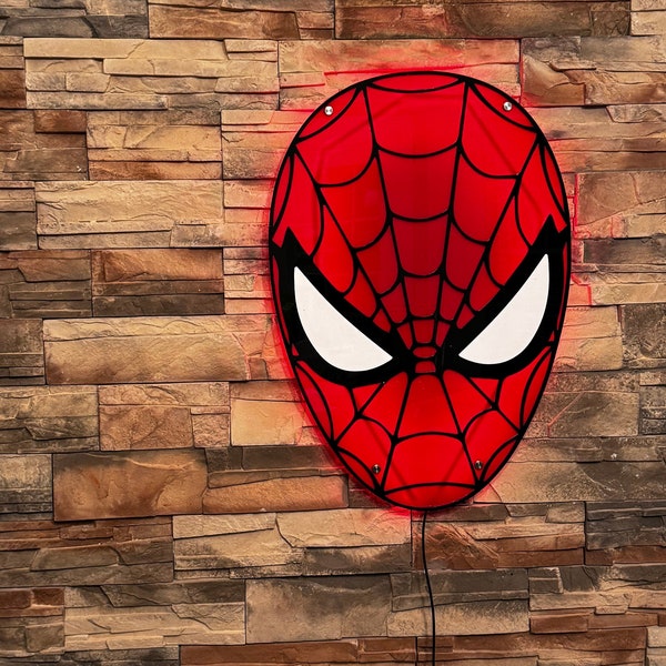 Superhero Head 3D looking layered acrylic sign.  Backlit with red glow.  Great for an awesome looking kid's or game room.