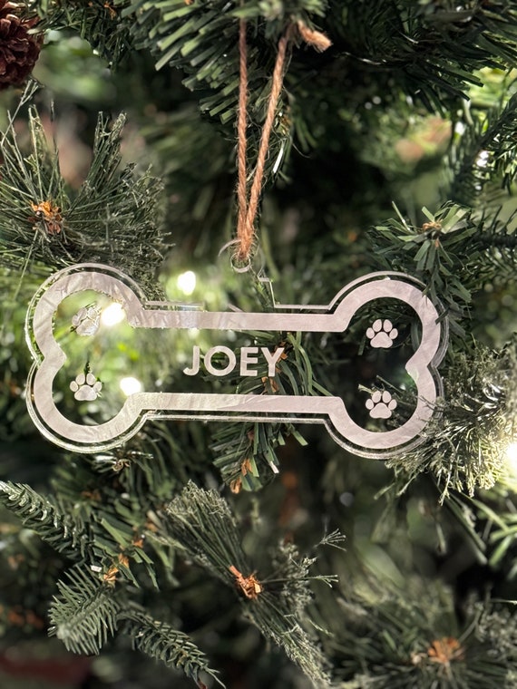 Personalized Dog bone ornament.  A great way to show your love of your favorite pet.  Great Christmas Gift idea.  Custom name.