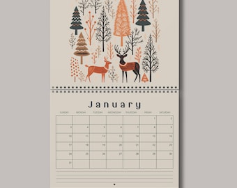 May include: A wall calendar for January featuring a beige background with a top illustration of stylized trees and two deer in shades of orange, brown, and dark gray. The grid below displays the days of the week and dates for the month of January.