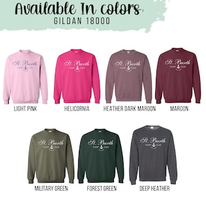 May include: A Gildan 18000 sweatshirt available in ten colors: light pink, helicornia, heather dark maroon, maroon, military green, forest green, deep heather, black, navy, and white. The sweatshirt features a white graphic with the text "St. Barth Yacht Club" and an anchor.