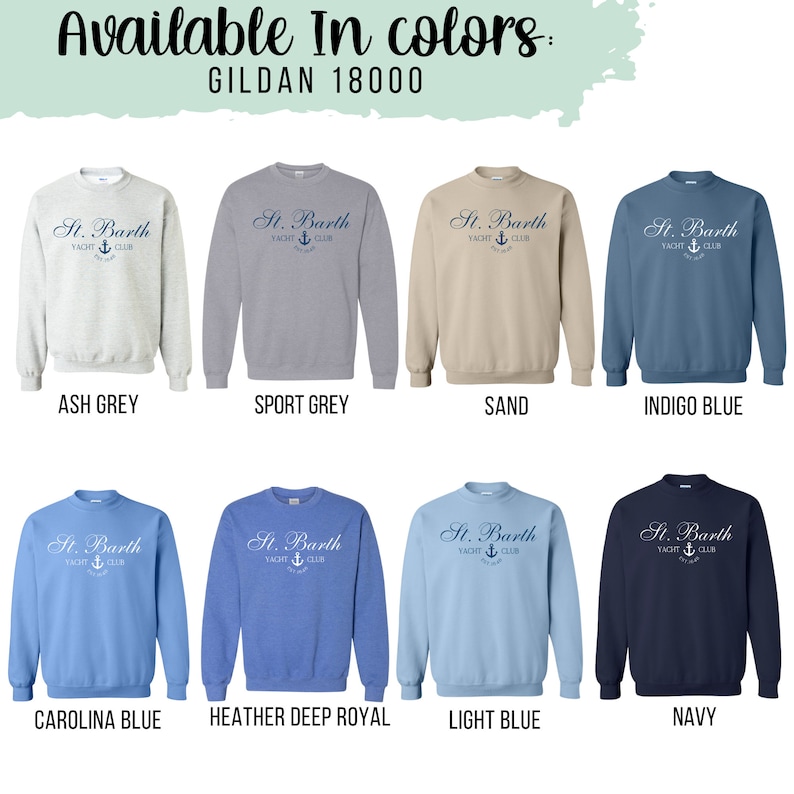 May include: A Gildan 18000 sweatshirt is shown in ten different colors: ash grey, sport grey, sand, indigo blue, carolina blue, heather deep royal, light blue, navy, black, and white. The sweatshirt has a logo that says "St. Barth Yacht Club" with an anchor symbol.