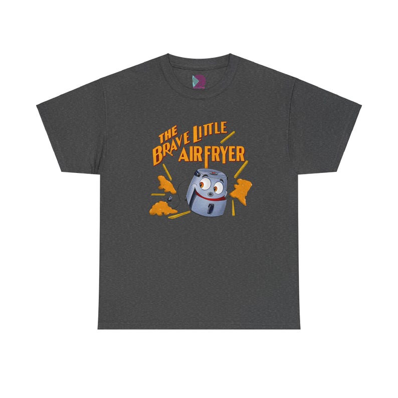 May include: A dark heather grey t-shirt with a cartoon air fryer with googly eyes and a smiling face. The air fryer is surrounded by orange french fries. The text "The Brave Little Air Fryer" is printed in orange and white on the shirt.