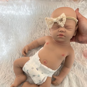 Full body silicone doll with hair, newborn size