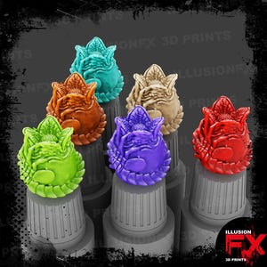 May include: A collection of colorful, alien-like sculptures in shades of green, teal, brown, tan, purple, and red. Each sculpture is perched atop a gray, cylindrical base. The sculptures have a textured, organic appearance, with intricate details.