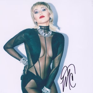 Signed MILEY CYRUS Autographed Photo w/ COA