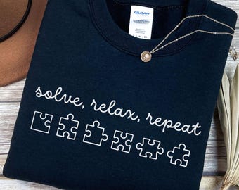 Sudadera para amantes de los rompecabezas, ideal para aficionados a los rompecabezas, competiciones de velocidad y equipos. Diseño con piezas de rompecabezas a juego.