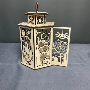 Lantern Halloween, spooky Halloween lantern, laser cut lantern in Halloween design, ghosts and ghosts light show, lantern for LED