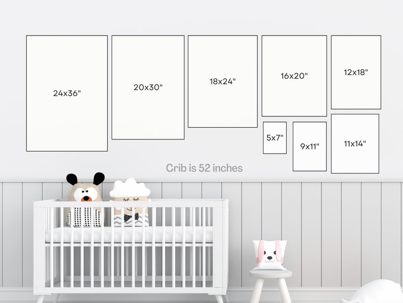 May include: A white crib with a white mattress and two stuffed animals on top. The crib is 52 inches wide. There are nine framed pictures on the wall above the crib, with measurements in inches.