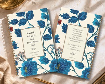 May include: Two spiral-bound prayer journals with a cream background and a blue floral pattern. The left journal cover reads: FAITH. GRACE. And Everything Else. Prayer Journal. The right journal cover features text about prayers and 1 Corinthians 16:14.