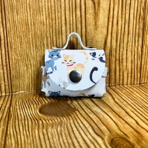 Earbud case with keychain loop