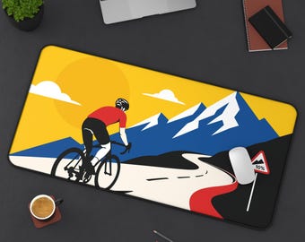 Minimalist Cycling Art Desk Mat - Bold Retro Mountain Ride Design in Yellow, Red & Blue